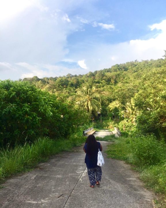 Didi taking a stroll down a quiet road in Ranong, Thailand
