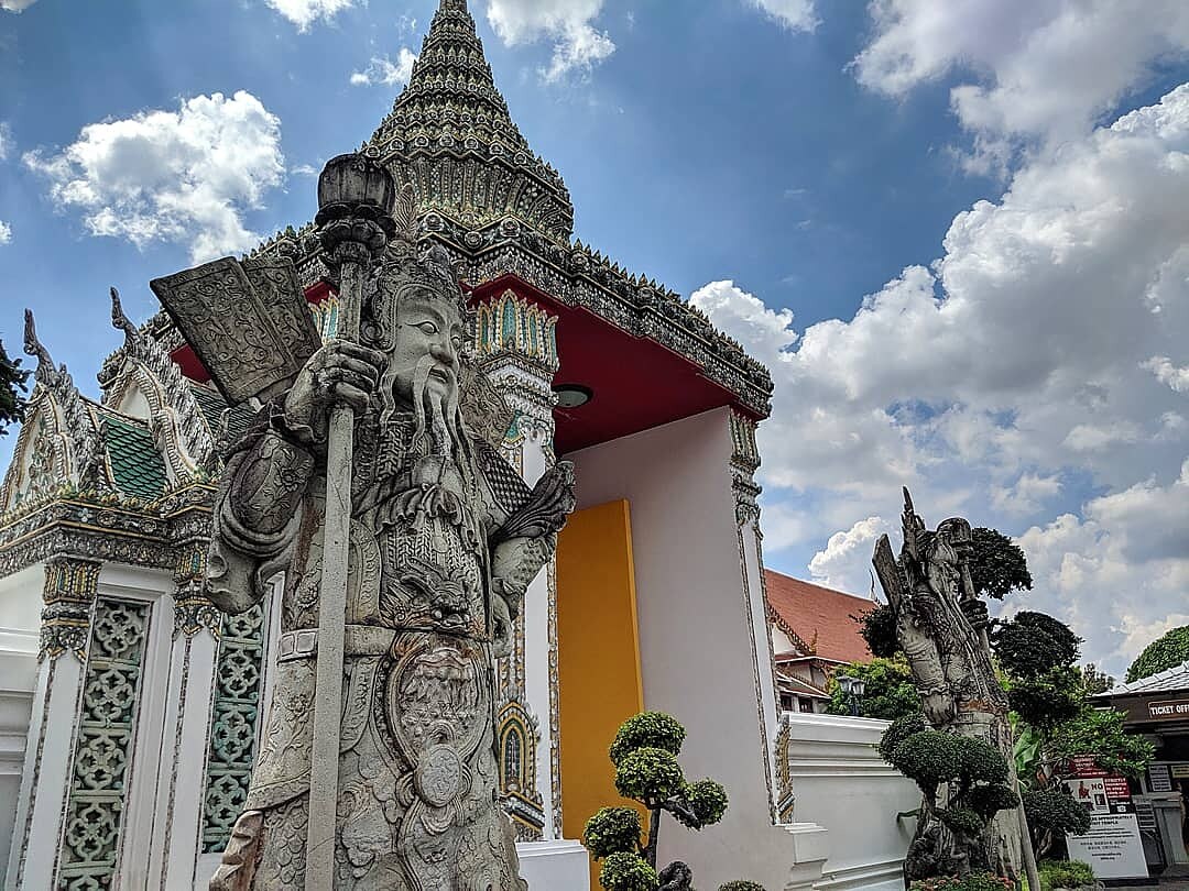 temple with clouds in background