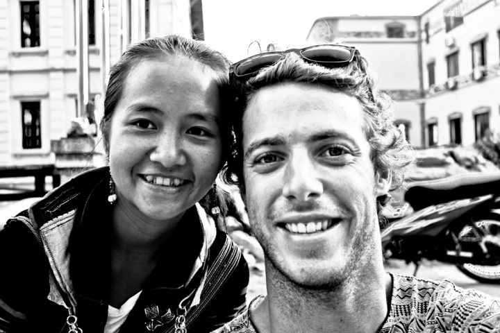 Justin with a local friend he made while traveling in Vietnam