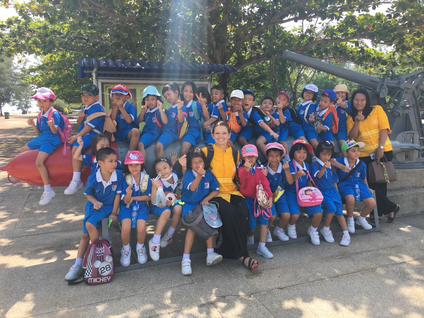 teacher with students in Thailand