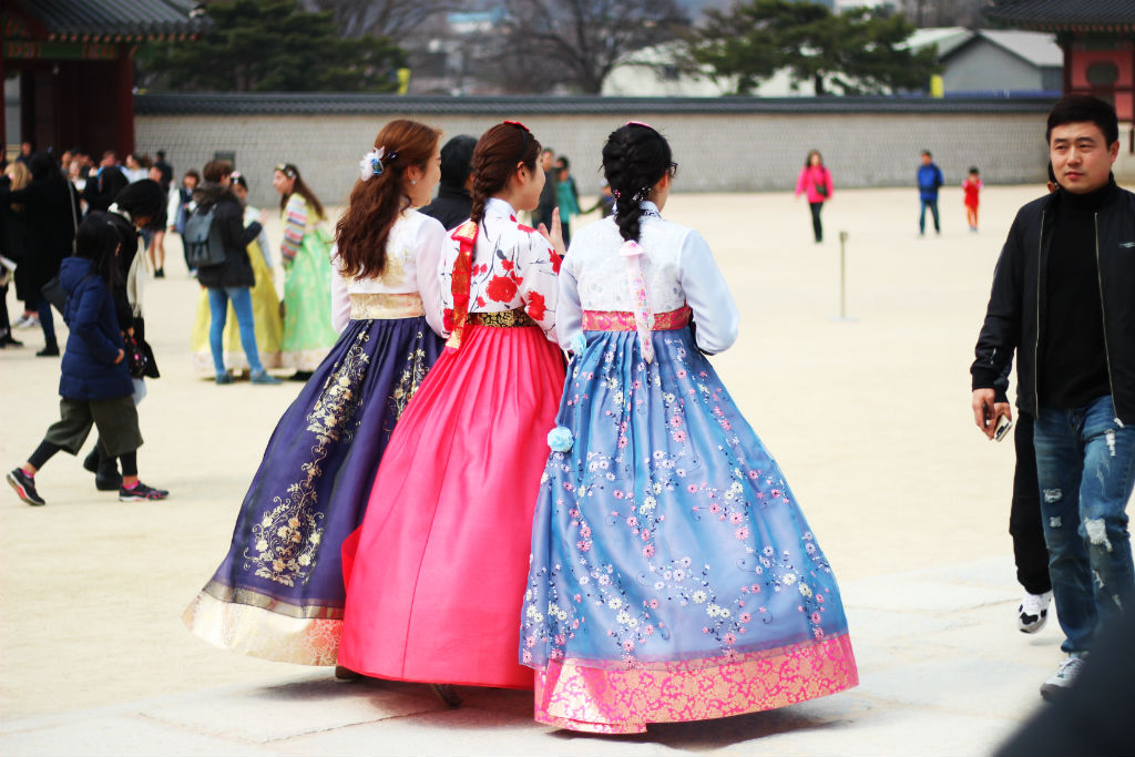Women in traditional dress walk in South korea