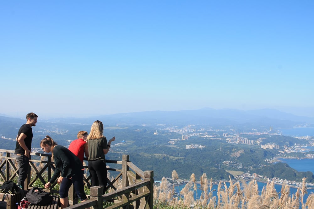 friends looking out over cityscape inTaiwan