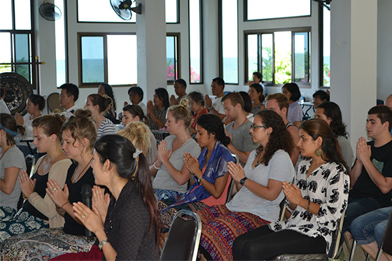 English teachers practising the "wai"during their cultural orientation course in Thailand
