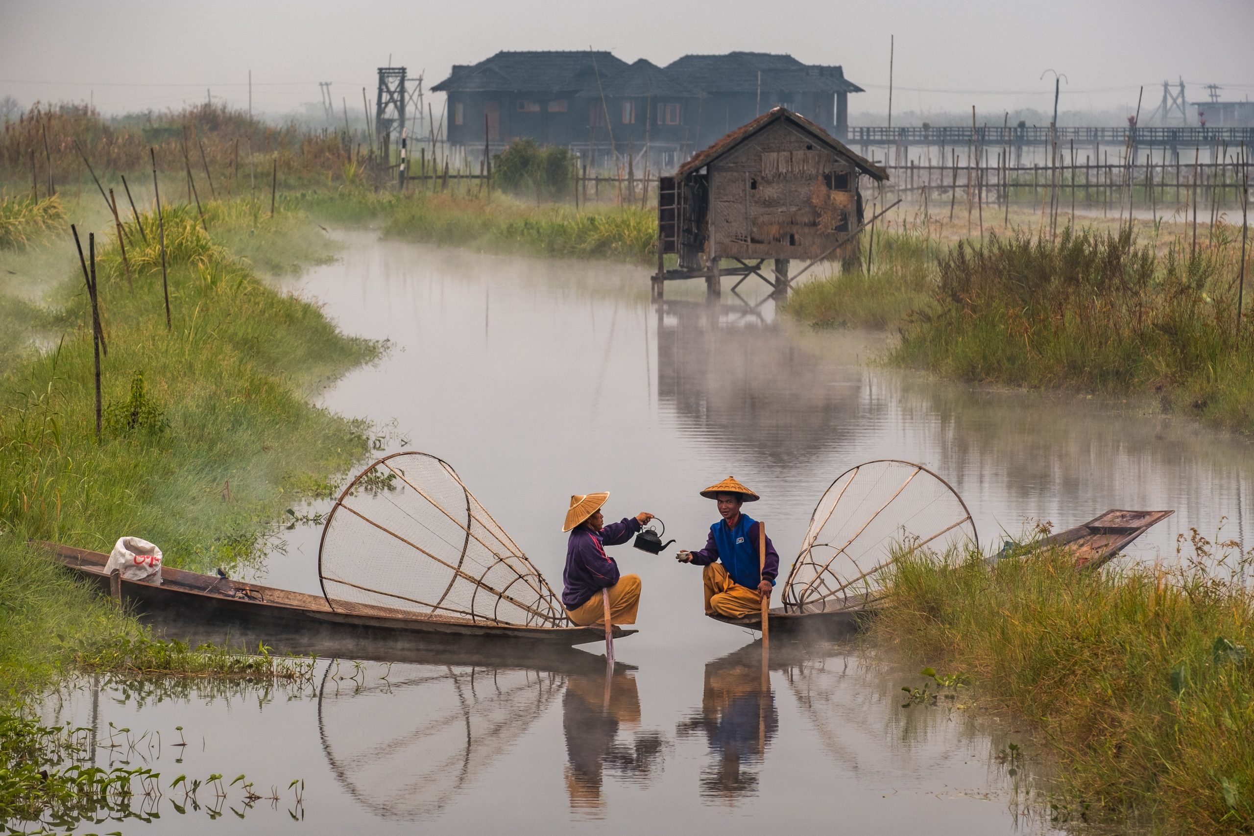 two people in boats