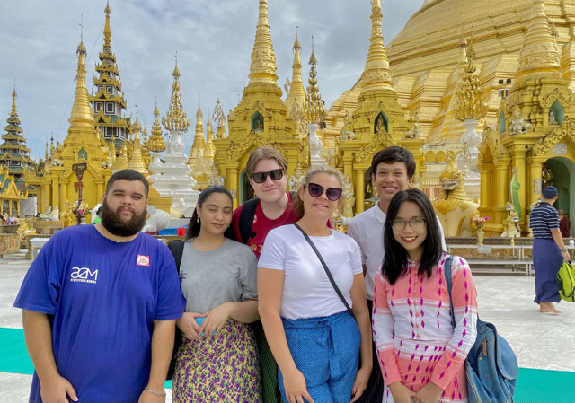 Teachers experience the breathtaking Shwedagon Pagoda in Yangon as part of their immersive cultural orientation.