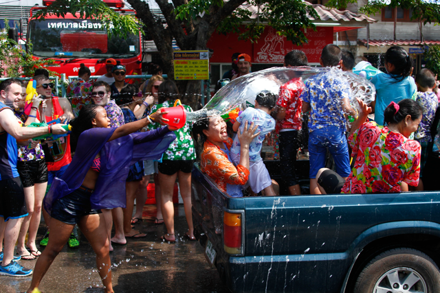 Teachers join in the Songkran festivities with the local community