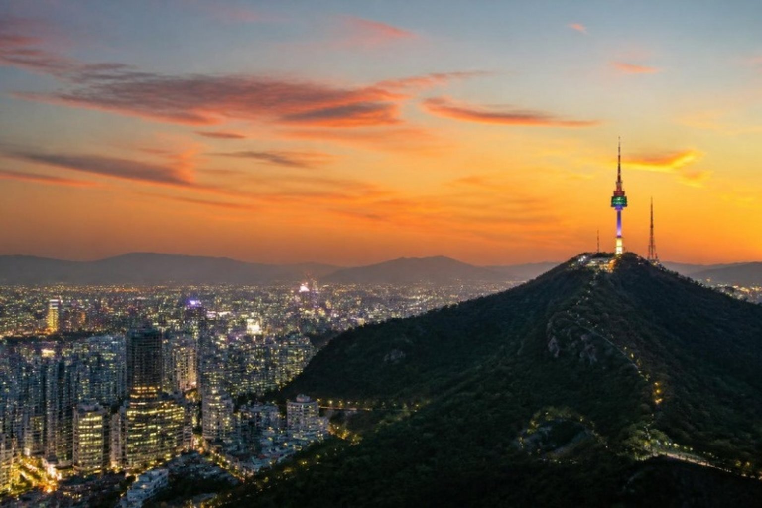From the view at N Seoul Tower to quiet neighbourhood streets, Seoul mixes modern skyscrapers with centuries of history.