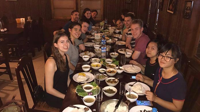 Participants enjoy an evening meal together.
