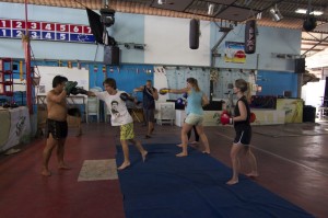 Students take part in a Muay Thai lesson as part of their cultural orientation course