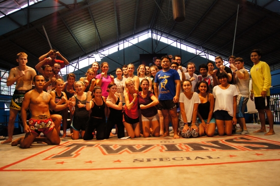 TESOL students pose for a photo in the ring at the Hua Hin Muay Thai gym