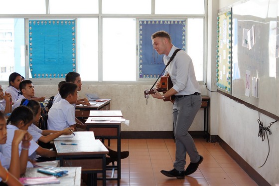 This guy brought such a unique atmosphere to his class by playing his guitar and singing along with his students at the beginning and end of each lesson. It's safe to say that he was a huge success in the classroom!