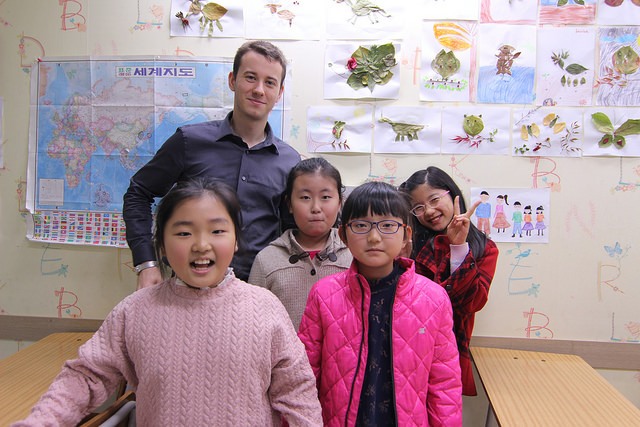 English teacher with students in South Korea