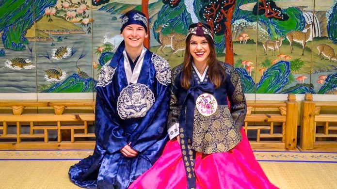 TravelBud’s Grace Martens, trying on traditional Korean Hanbok during her cultural orientation