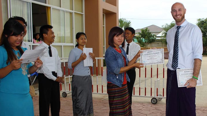 Students in Myanmar with their certificates