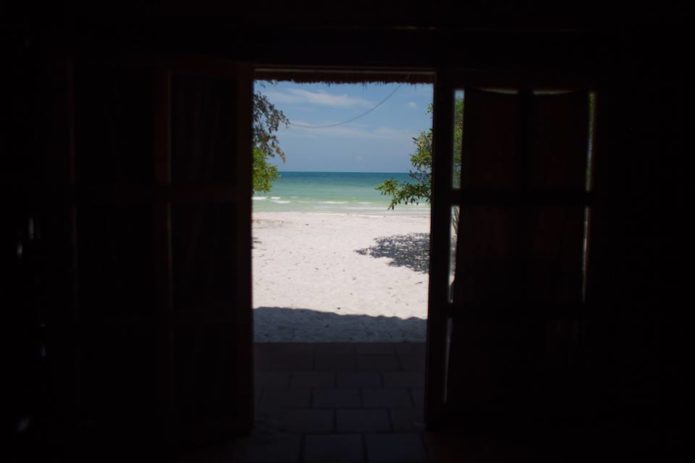 Touching the ocean from cabin in Koh Rong