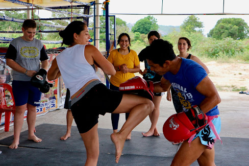 ESL Teachers in Thailand at a Muay Thai gym during their cultural orientation with TravelBud