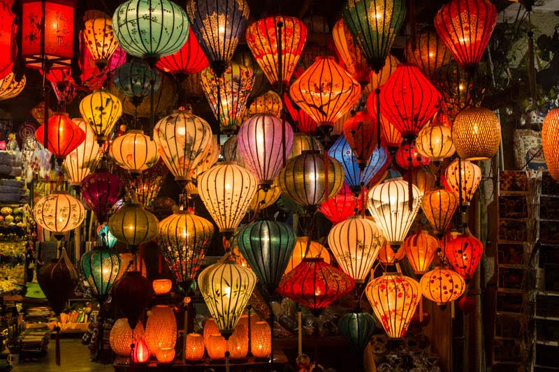 colorful lanterns hang in the streets of Hoi Ain