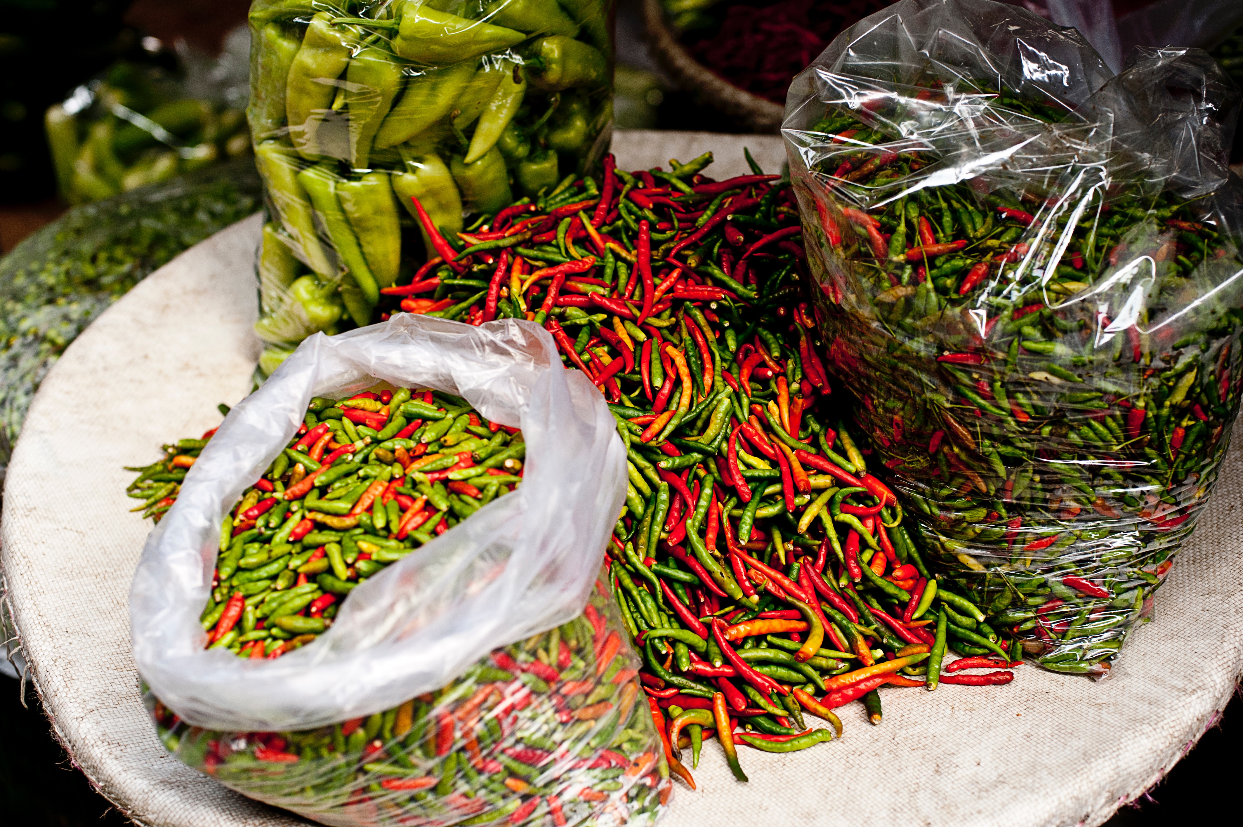 bags of red and green chili peppers - a common ingredient in most isaan food dishes