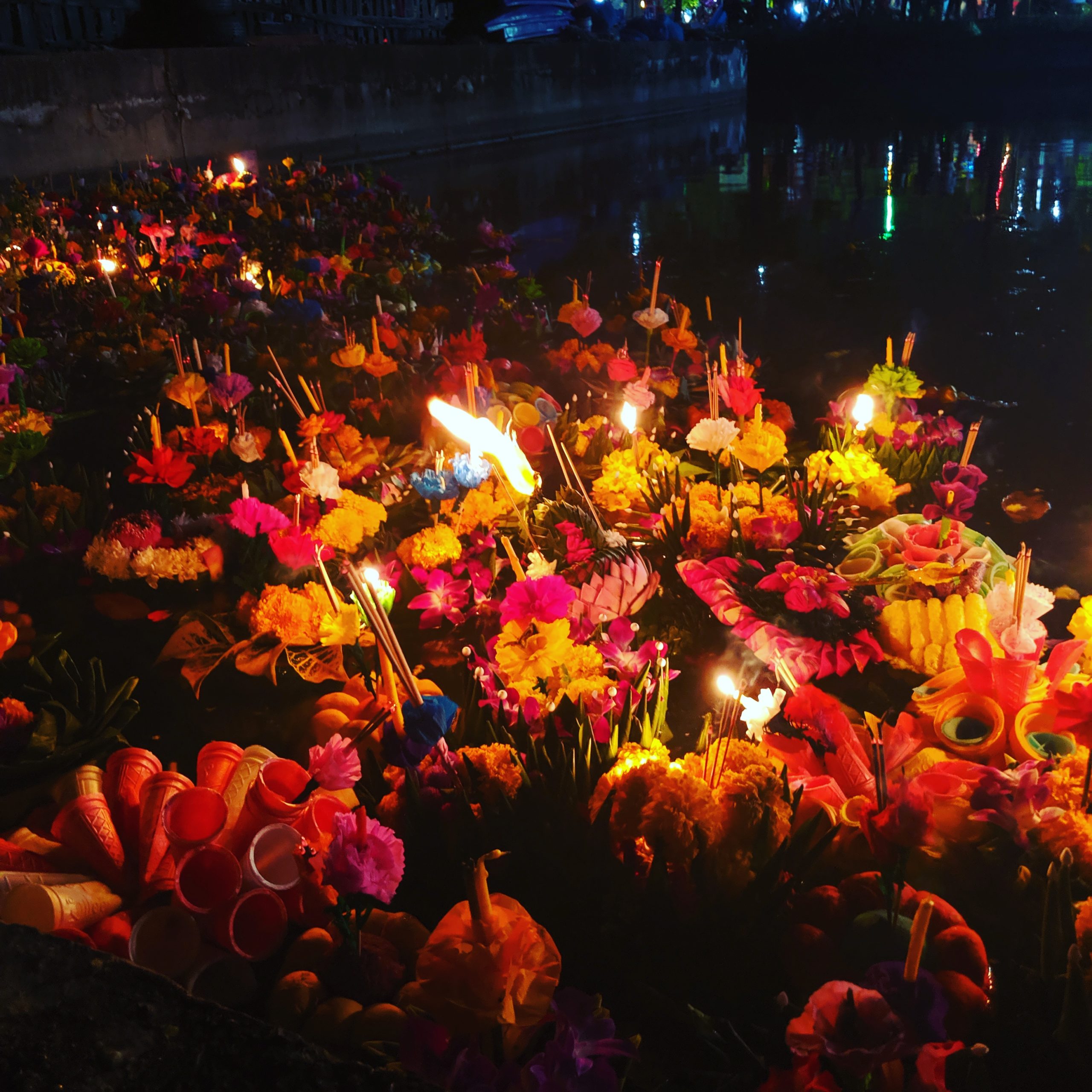 Loy krathong lanterns with lighted candles