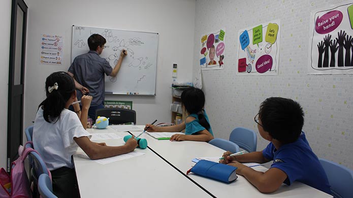 A TravelBud teacher in the classroom at his language school.