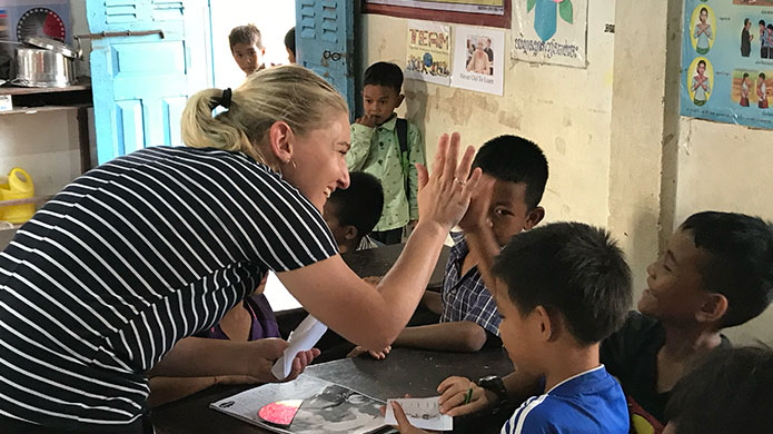 teacher in classroom cambodia